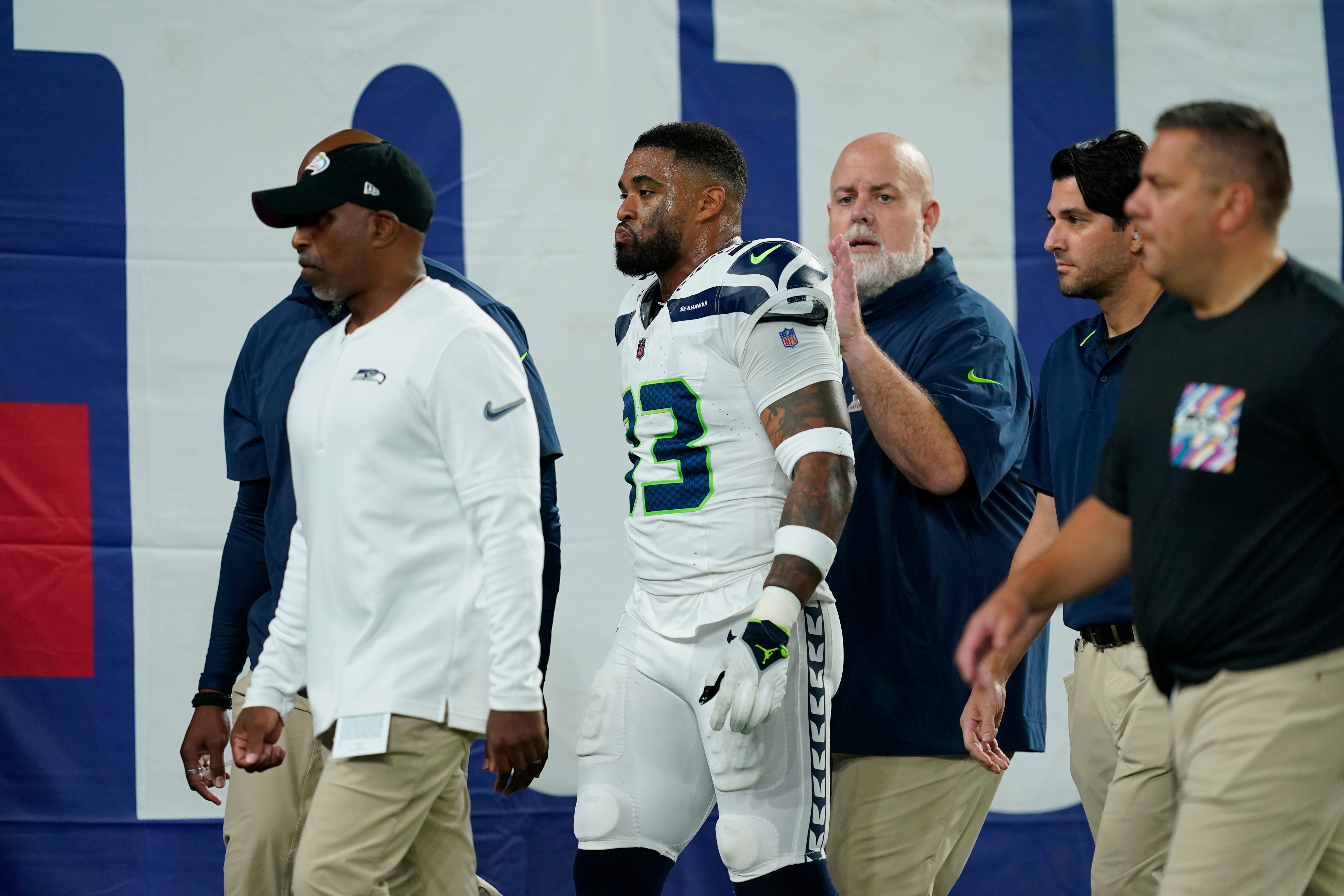 Seattle Seahawks safety Jamal Adams (33) walks off the field due to injury in the first half against the New York Giants at MetLife Stadium on Monday, Oct. 2, 2023, in East Rutherford